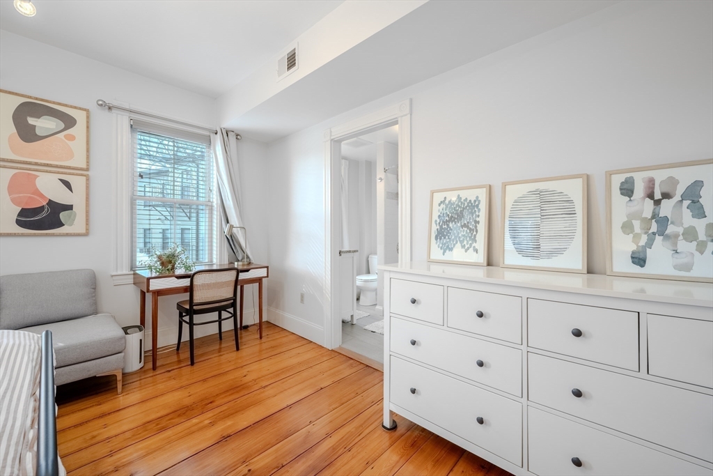20 Porter Street, Unit 2 Boston, MA 02130 - Photo 25 of 35 a bedroom with furniture and a window