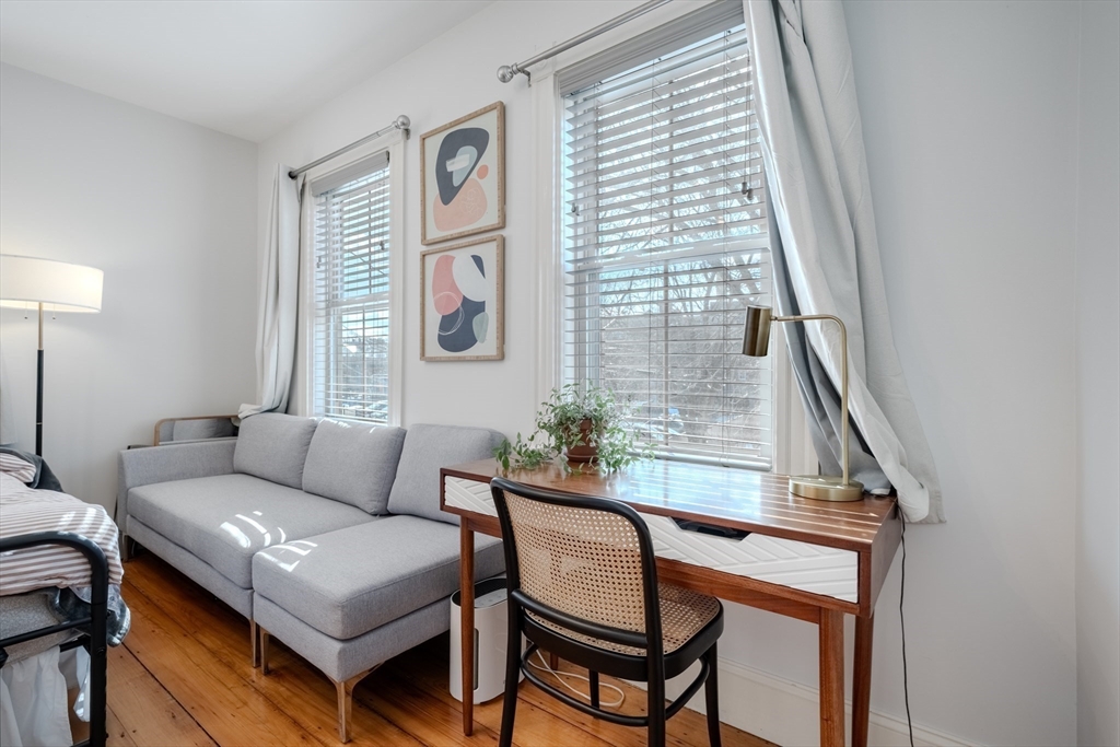 20 Porter Street, Unit 2 Boston, MA 02130 - Photo 27 of 35 a living room with furniture and a window