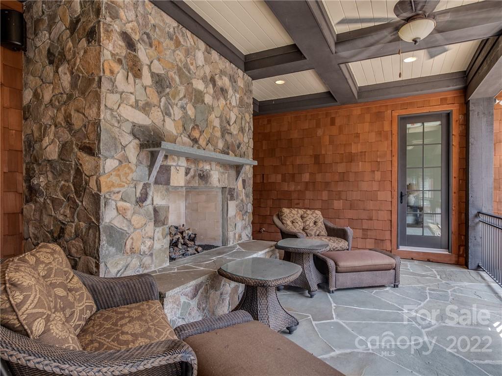 14140 Claysparrow Road Charlotte, NC 28278 - Photo 11 of 48 a outdoor living space with furniture and a fireplace