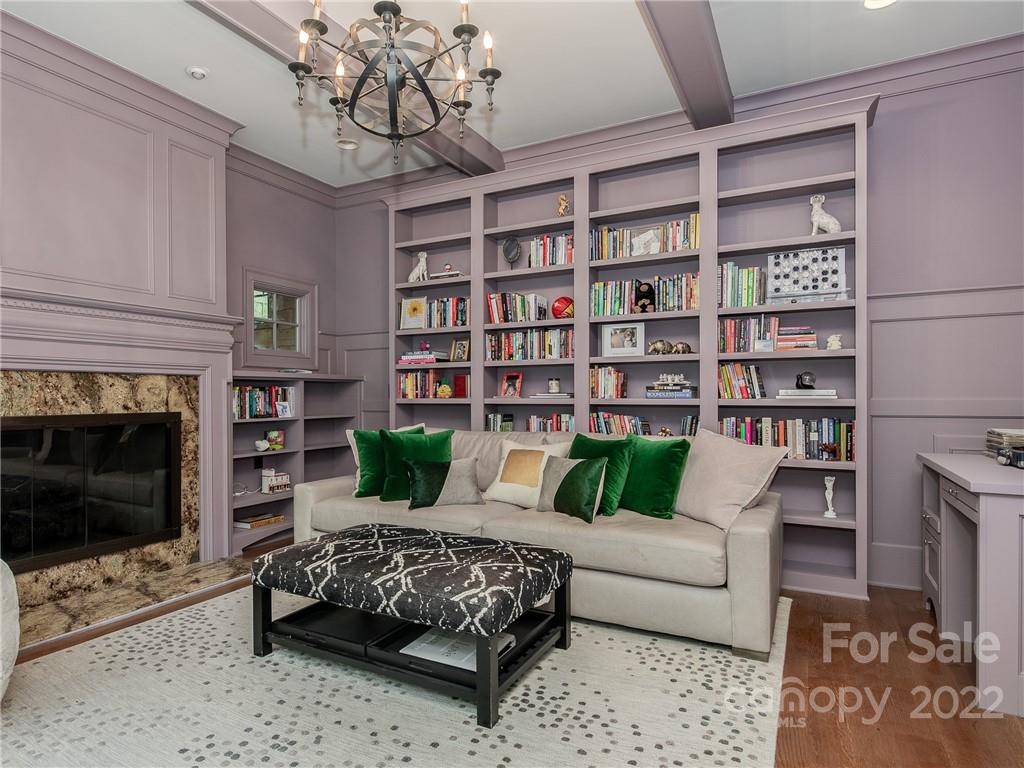 14140 Claysparrow Road Charlotte, NC 28278 - Photo 21 of 48 a living room with furniture and a fireplace
