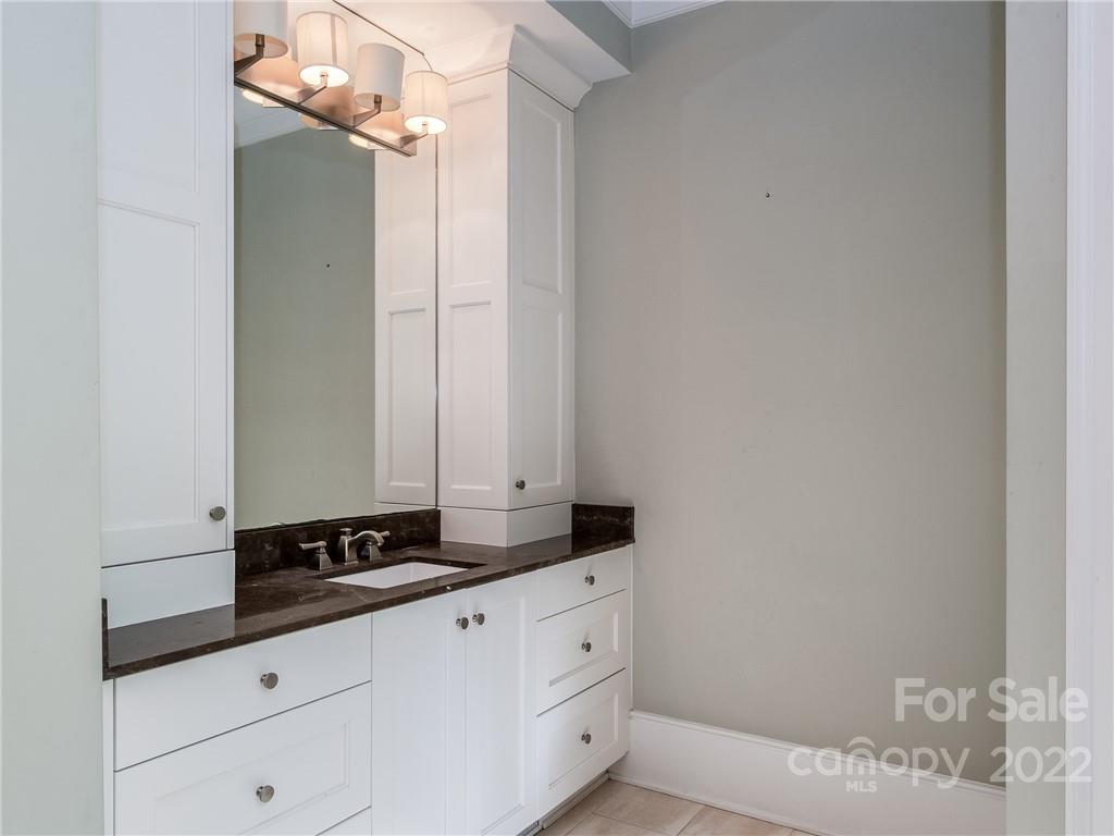 14140 Claysparrow Road Charlotte, NC 28278 - Photo 27 of 48 a bathroom with a sink and a mirror