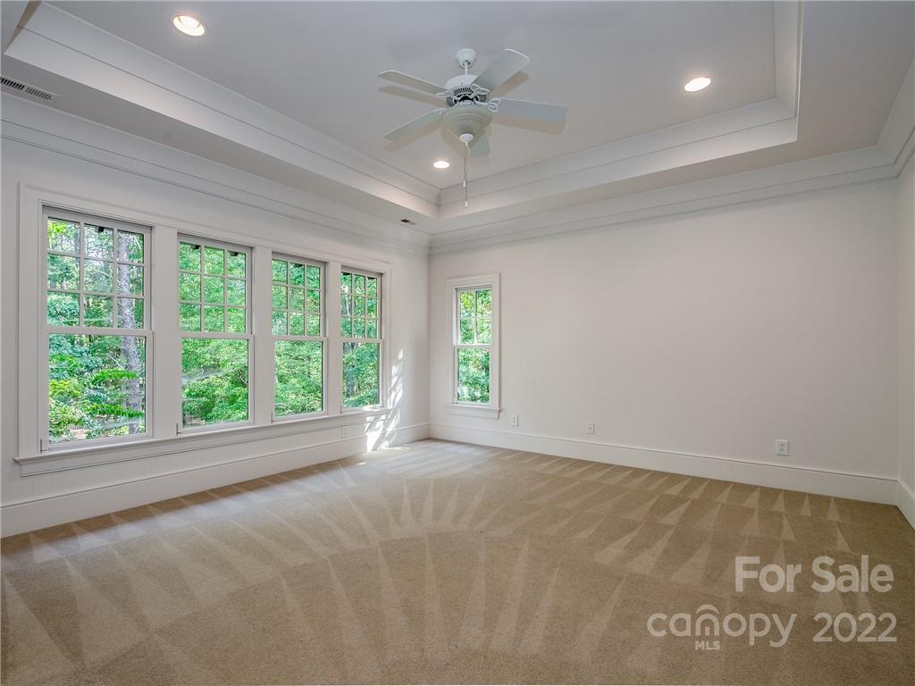 14140 Claysparrow Road Charlotte, NC 28278 - Photo 30 of 48 a view of an empty room with a window