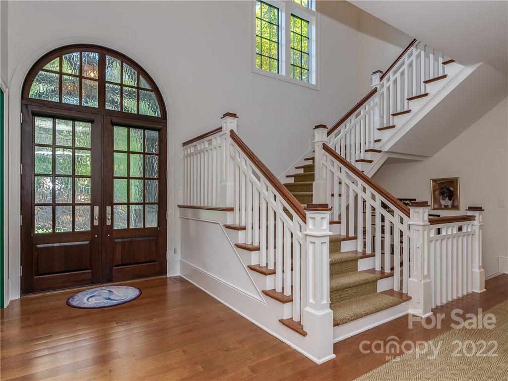14140 Claysparrow Road Charlotte, NC 28278 - Photo 7 of 48 a view of entryway with workspace and wooden floor