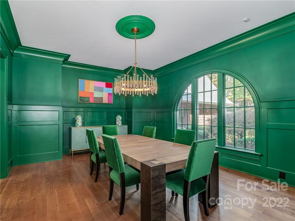 14140 Claysparrow Road Charlotte, NC 28278 - Photo 8 of 48 a view of a dining room with furniture window and wooden floor