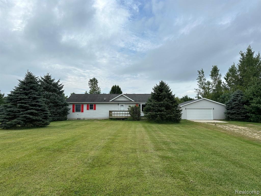 1239 West Barnes Road Fostoria, MI 48435 - Photo 1 of 13