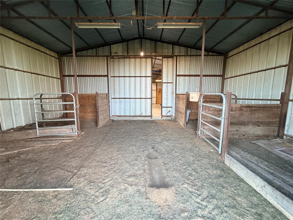 3472 North Masch Branch Road Denton, TX 76249 - Photo 11 of 17 a view of a room with racks on the wall