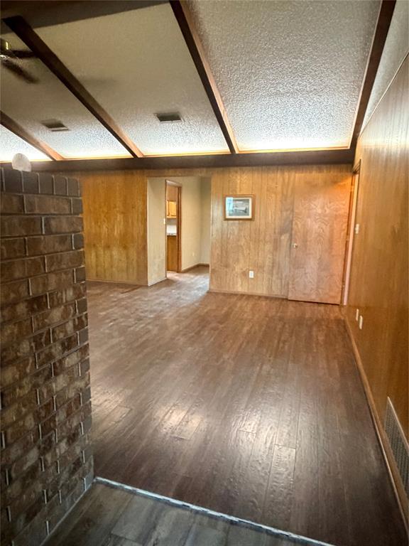 3472 North Masch Branch Road Denton, TX 76249 - Photo 16 of 17 an empty room with wooden floor and windows