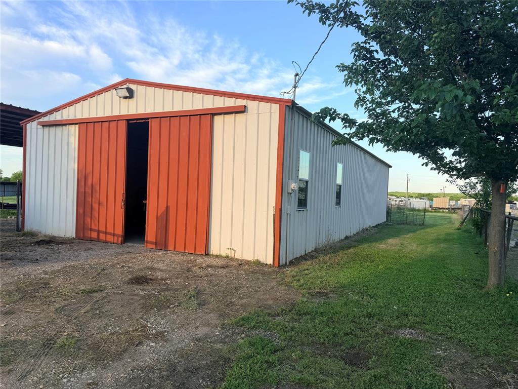 3472 North Masch Branch Road Denton, TX 76249 - Photo 10 of 17 a front view of a house with a yard