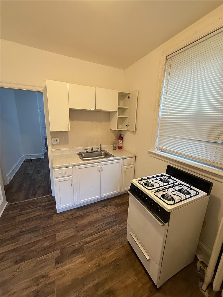 5107 Cottage Street, Unit 1 Philadelphia, PA 19124 - Photo 5 of 7 Functional kitchen with ample cabinet space, perfect for everyday living.