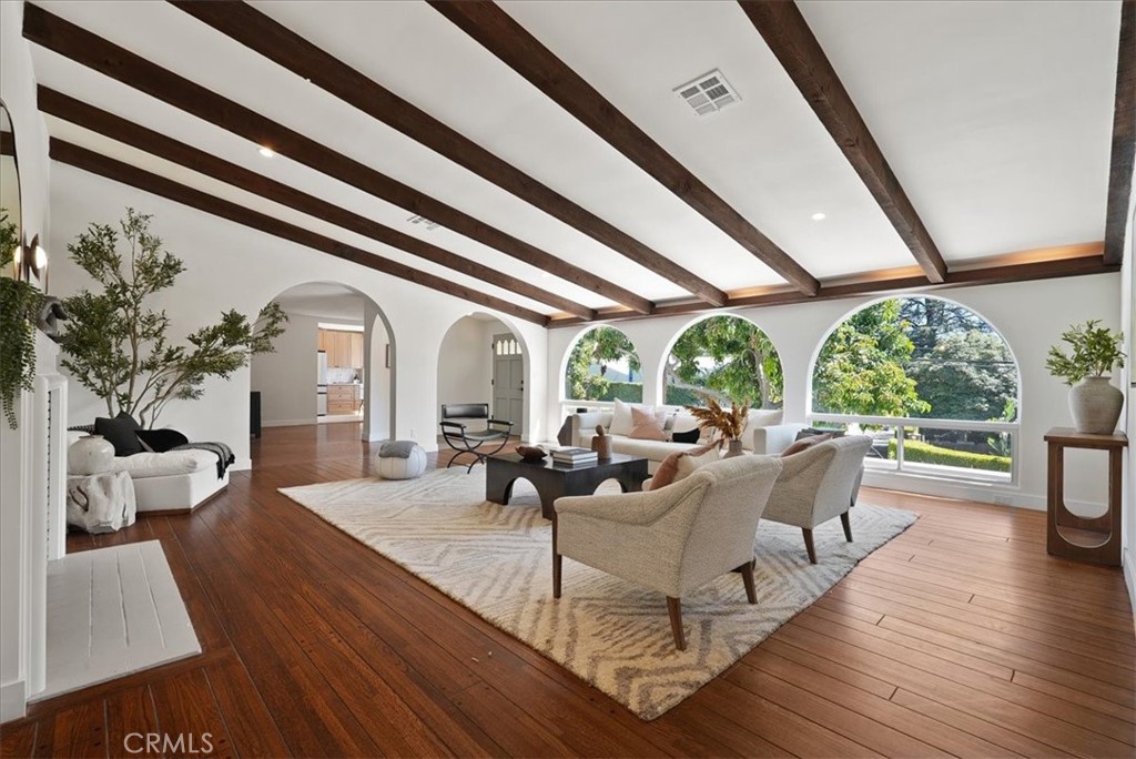 7404 Woodrow Wilson Drive Los Angeles, CA 90046 - Photo 12 of 57 a living room with furniture and a large window