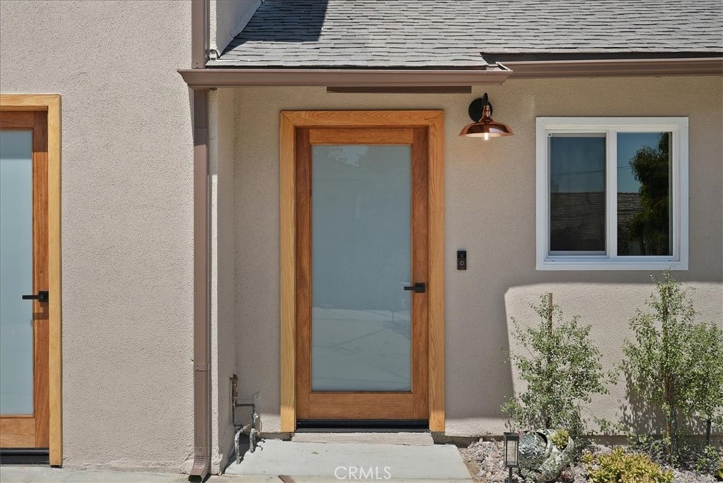 7404 Woodrow Wilson Drive Los Angeles, CA 90046 - Photo 31 of 57 a view of front door of a house