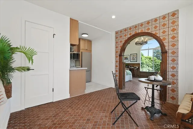 a living room with furniture and a table