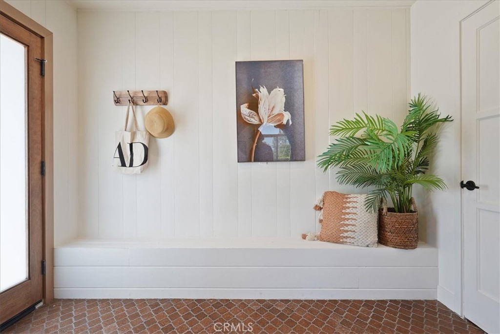 7404 Woodrow Wilson Drive Los Angeles, CA 90046 - Photo 33 of 57 a white bath tub sitting next to a white door