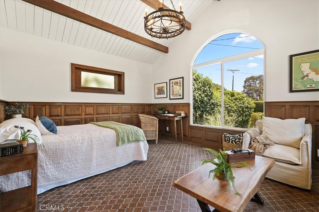 7404 Woodrow Wilson Drive Los Angeles, CA 90046 - Photo 35 of 57 a living room with furniture and a table