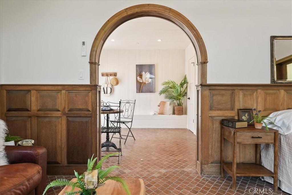 7404 Woodrow Wilson Drive Los Angeles, CA 90046 - Photo 38 of 57 a living room with furniture and a window