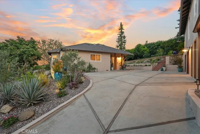 a view of a house with a street