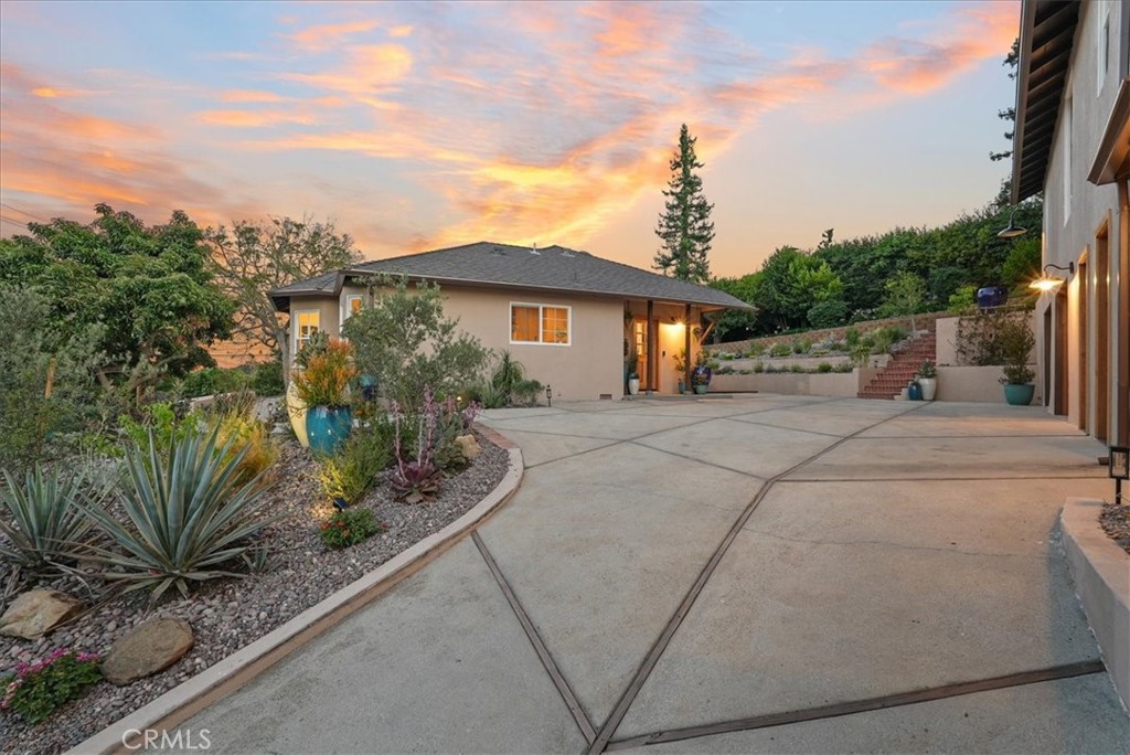7404 Woodrow Wilson Drive Los Angeles, CA 90046 - Photo 4 of 57 a view of a house with a street