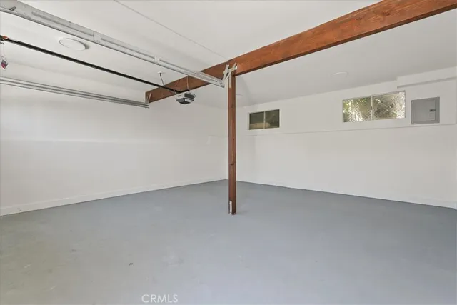 a front view of a house with parking area