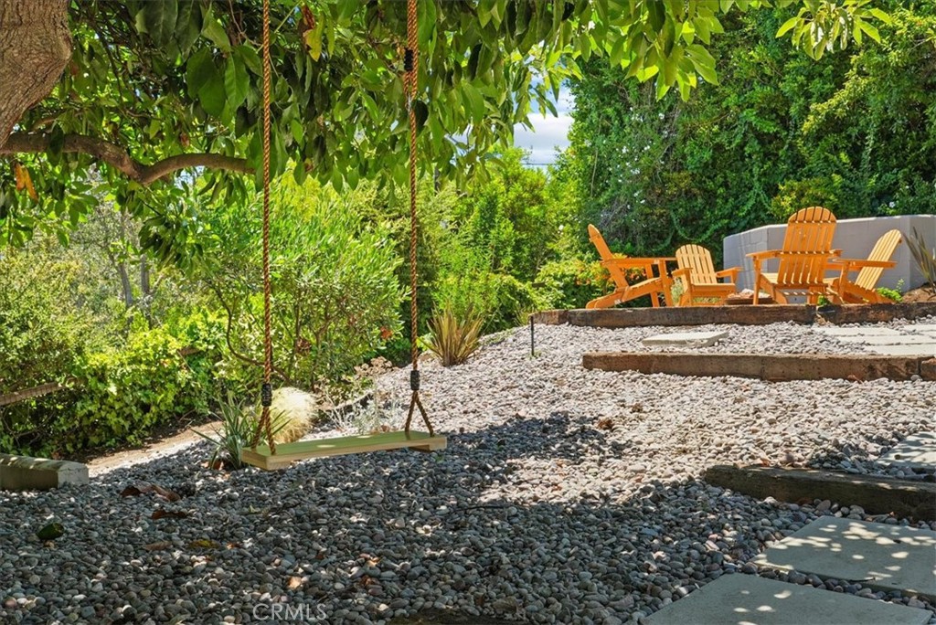7404 Woodrow Wilson Drive Los Angeles, CA 90046 - Photo 50 of 57 a view of a yard with plants
