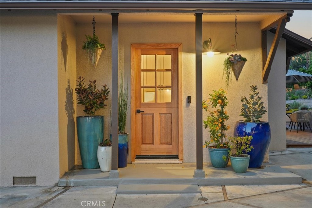 7404 Woodrow Wilson Drive Los Angeles, CA 90046 - Photo 5 of 57 a view of a entryway door front of house