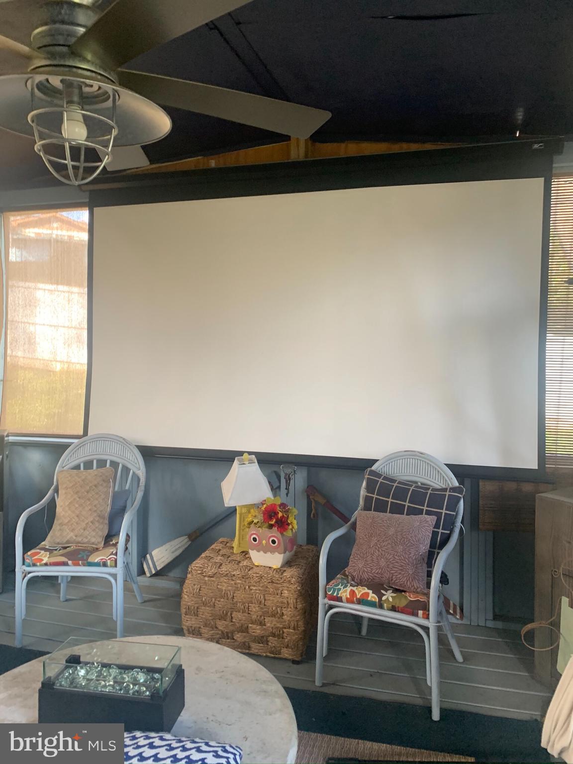206 Embleton Road Owings Mills, MD 21117 - Photo 18 of 29 Screened porch/ w projector and 120 inch screen