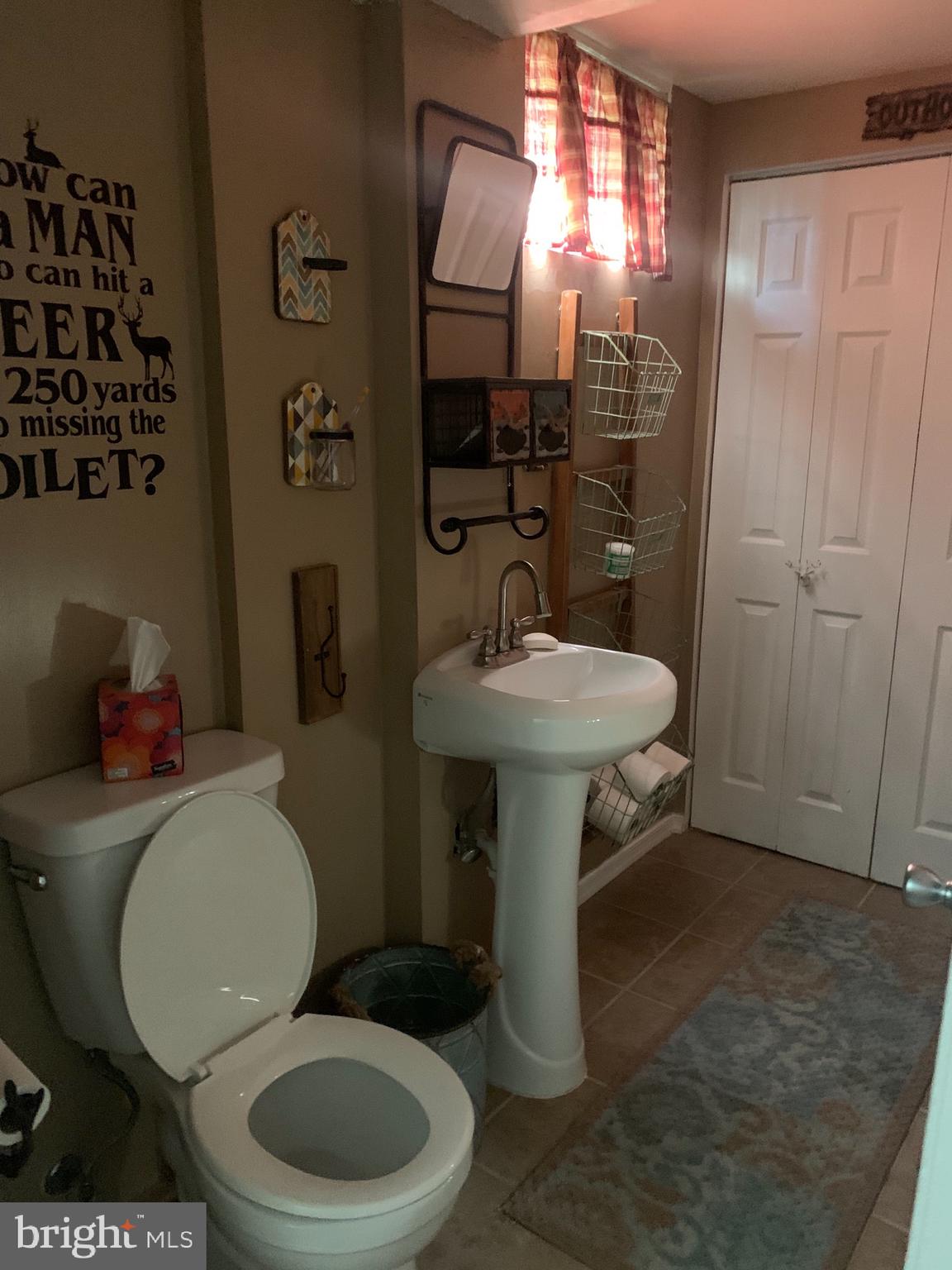 206 Embleton Road Owings Mills, MD 21117 - Photo 19 of 29 Half bath lower lever
