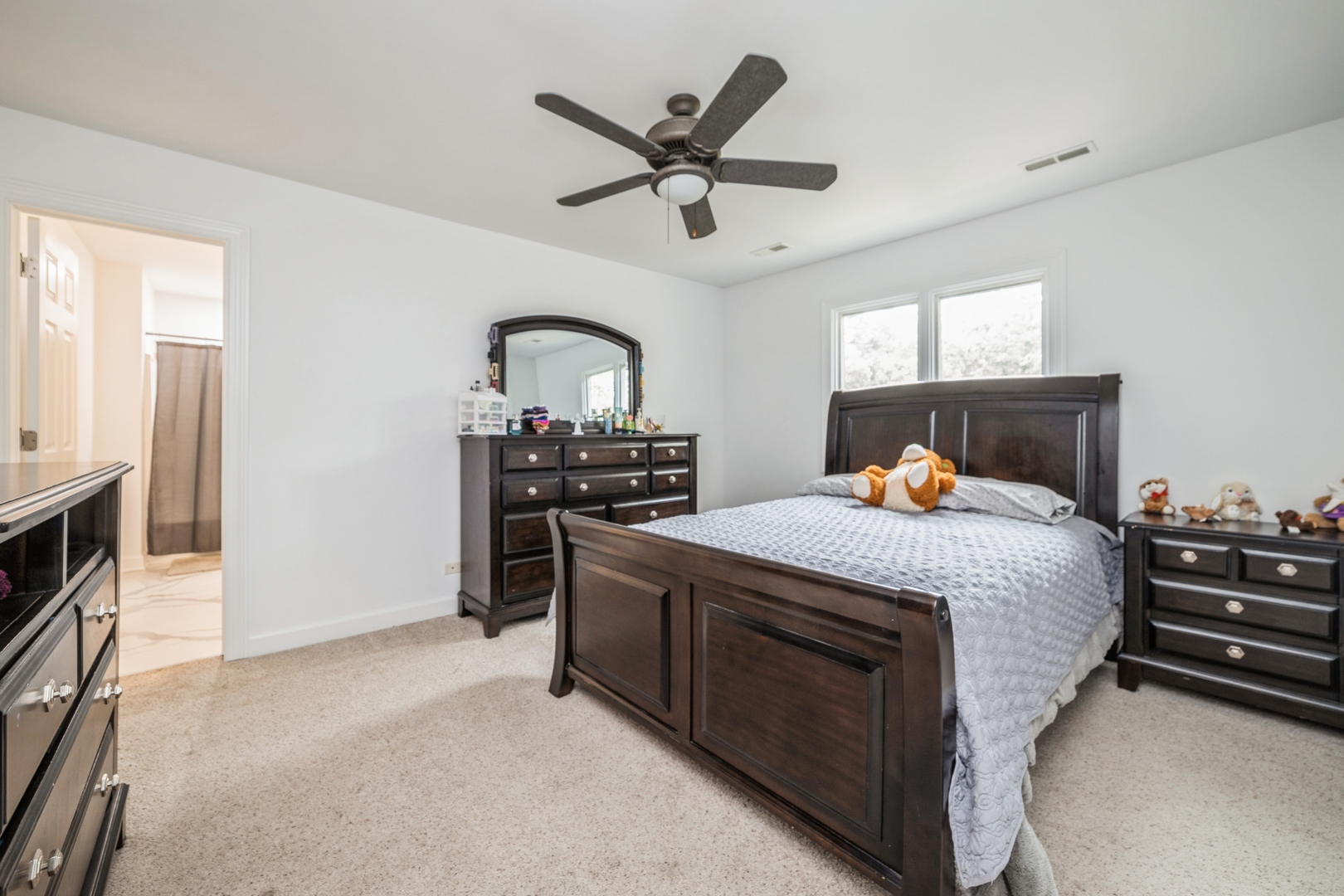 19217 Beck Road Marengo, IL 60152 - Photo 15 of 30 a bed room with furniture and a fireplace