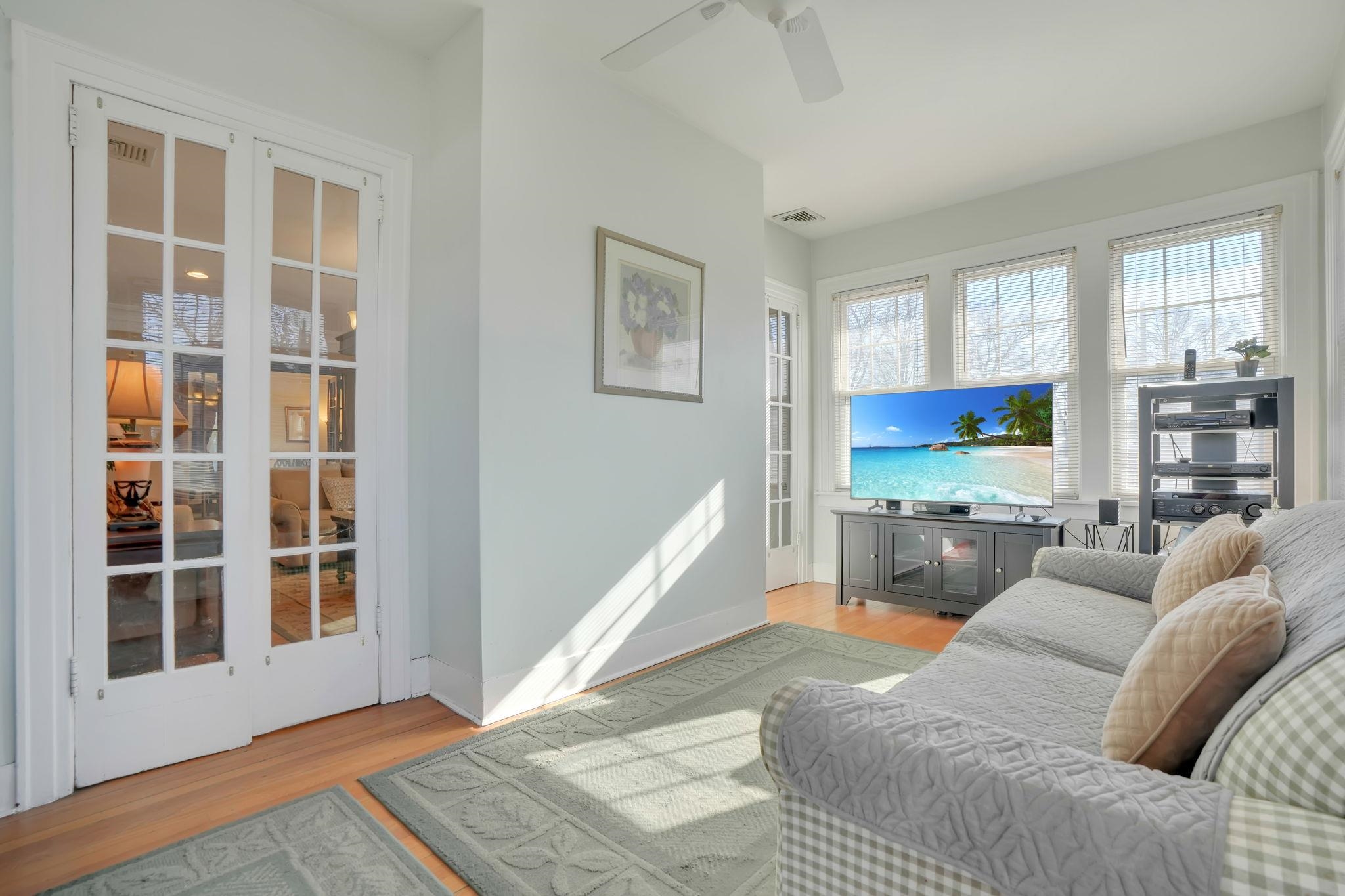 10 Lynn Court Rutherford, NJ 07070 - Photo 14 of 37 a living room with furniture and a window