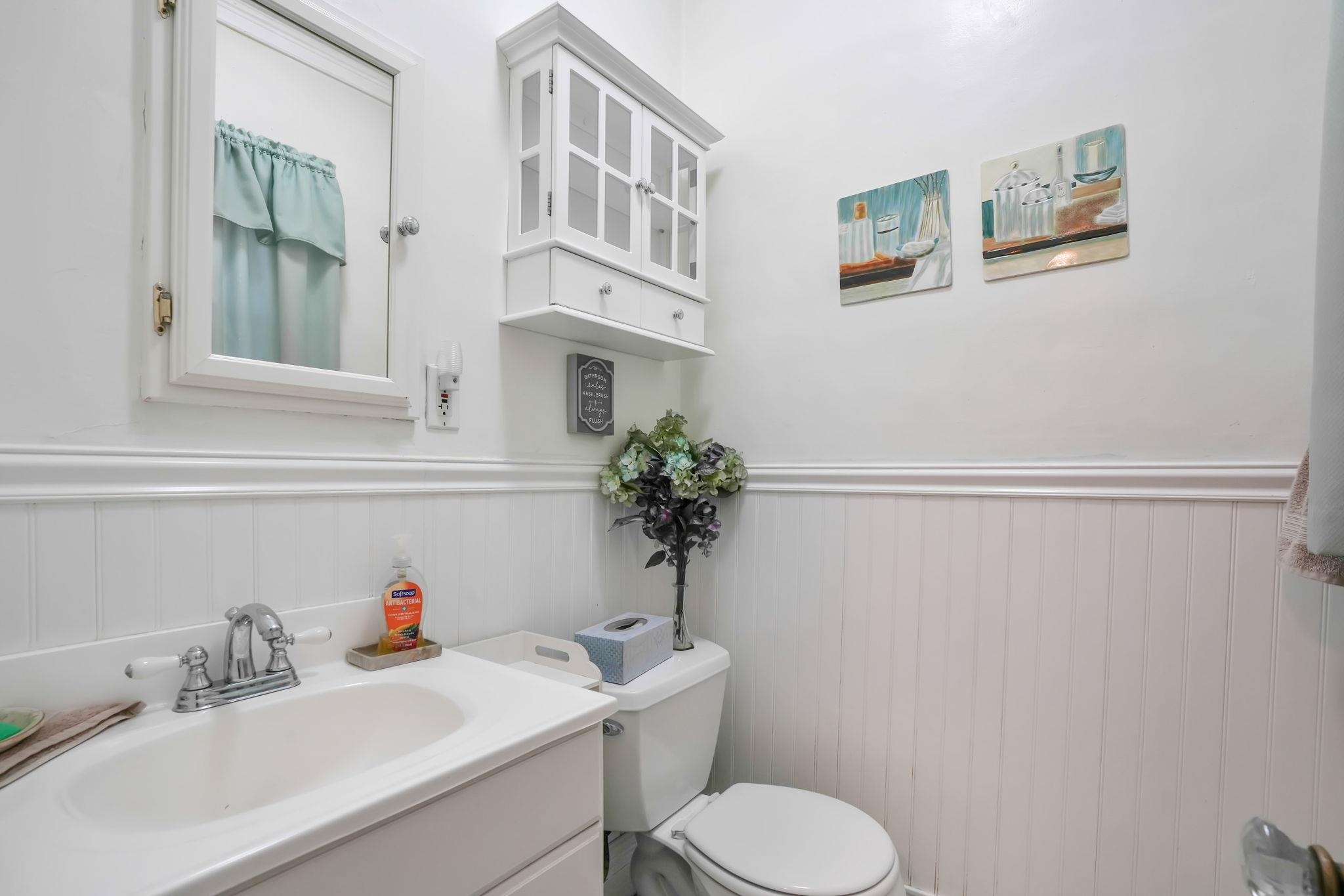 10 Lynn Court Rutherford, NJ 07070 - Photo 15 of 37 a bathroom with a sink toilet and a mirror