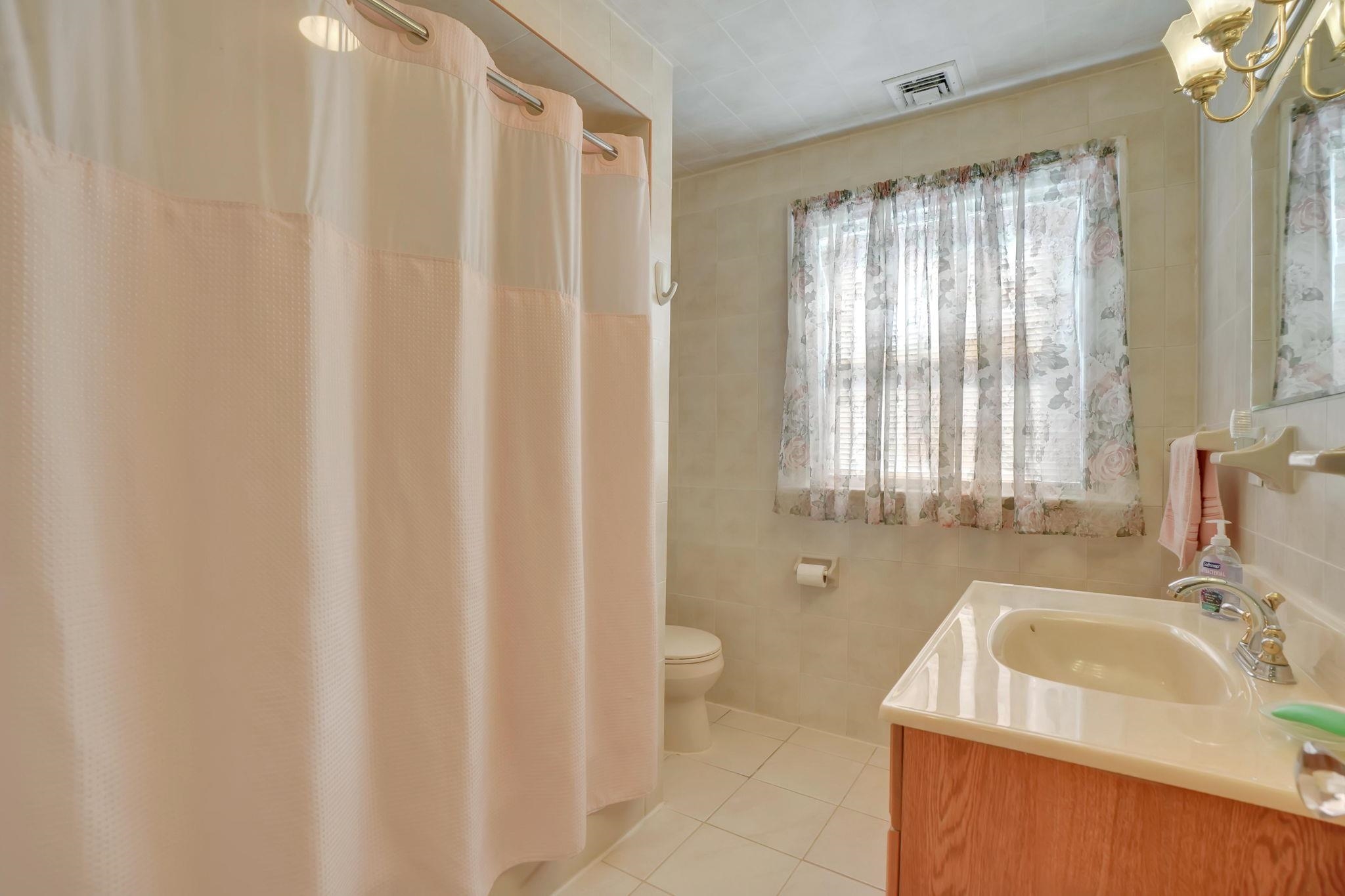 10 Lynn Court Rutherford, NJ 07070 - Photo 21 of 37 a bathroom with a sink and a sink