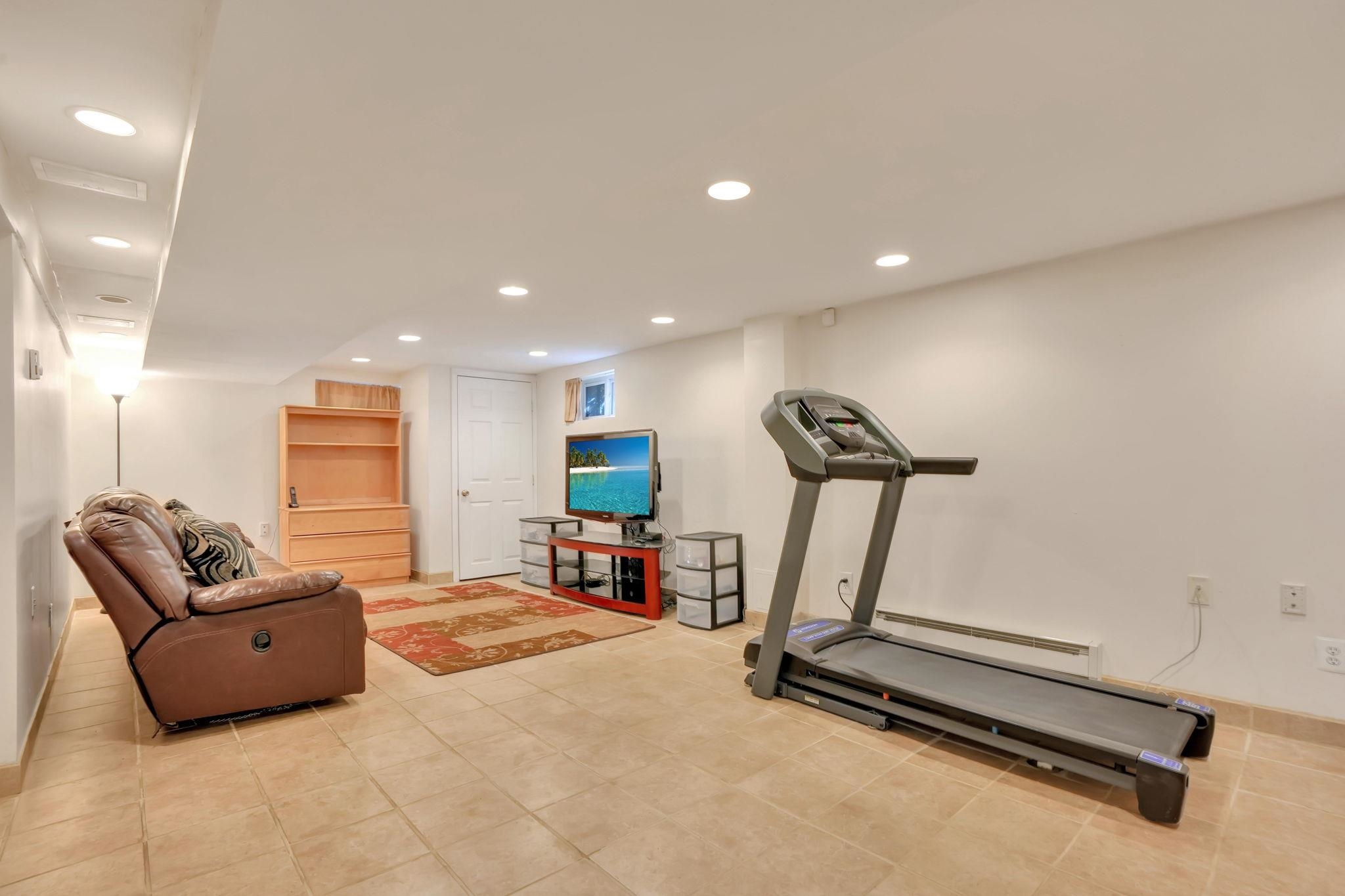 10 Lynn Court Rutherford, NJ 07070 - Photo 25 of 37 a view of a room with gym equipment