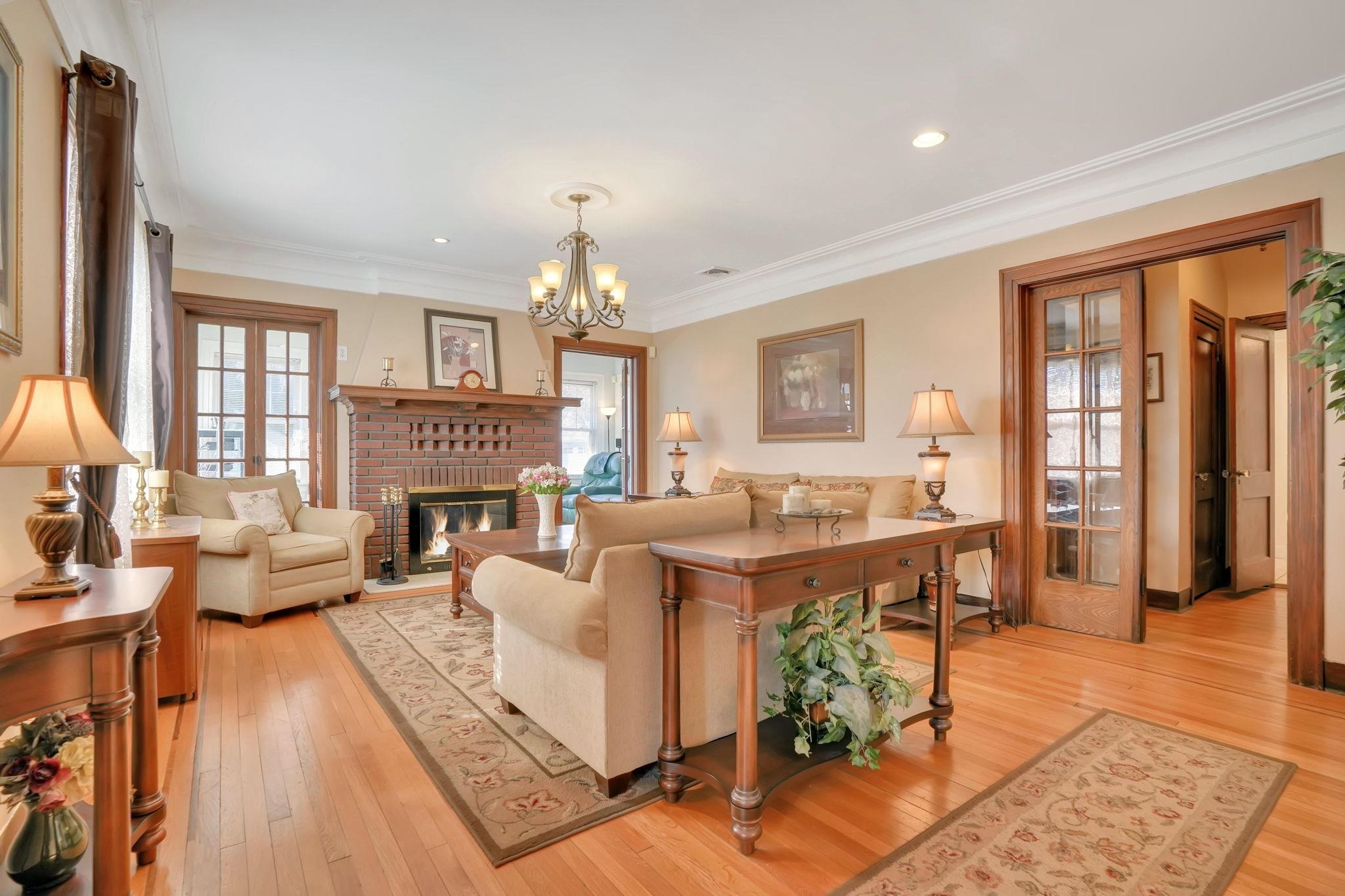 10 Lynn Court Rutherford, NJ 07070 - Photo 3 of 37 a living room with fireplace furniture and a window