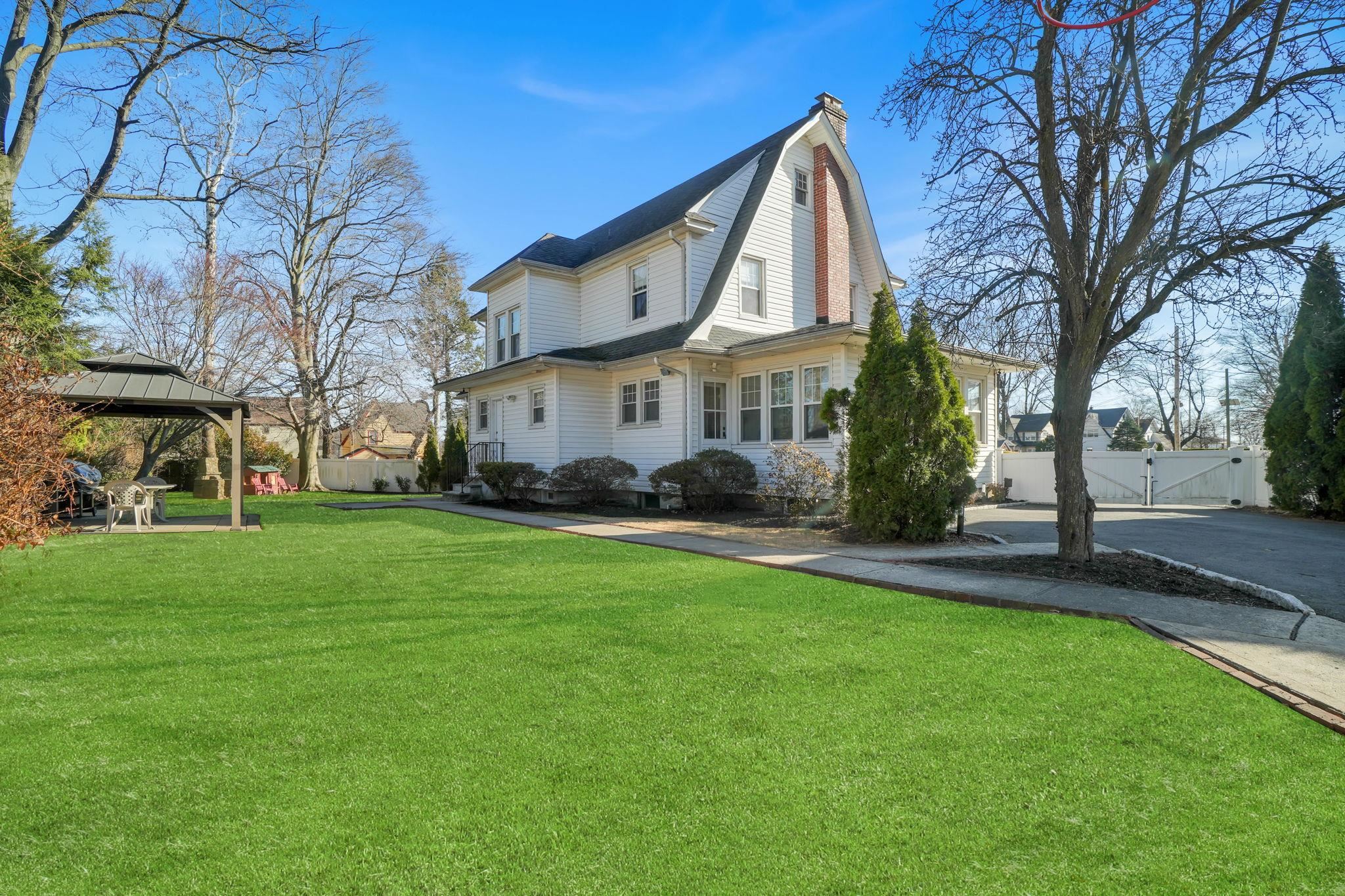 10 Lynn Court Rutherford, NJ 07070 - Photo 33 of 37 front view of a house with a yard