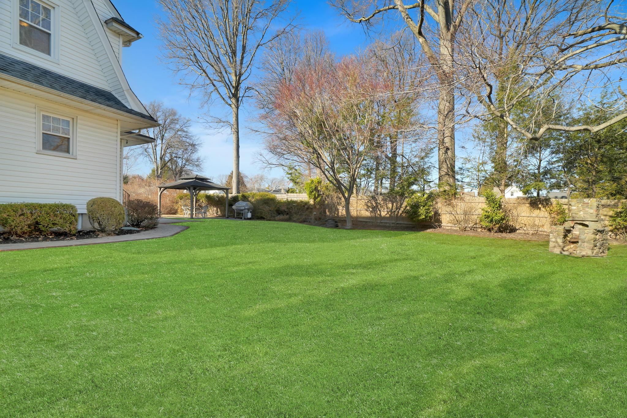 10 Lynn Court Rutherford, NJ 07070 - Photo 36 of 37 a view of a backyard with large trees