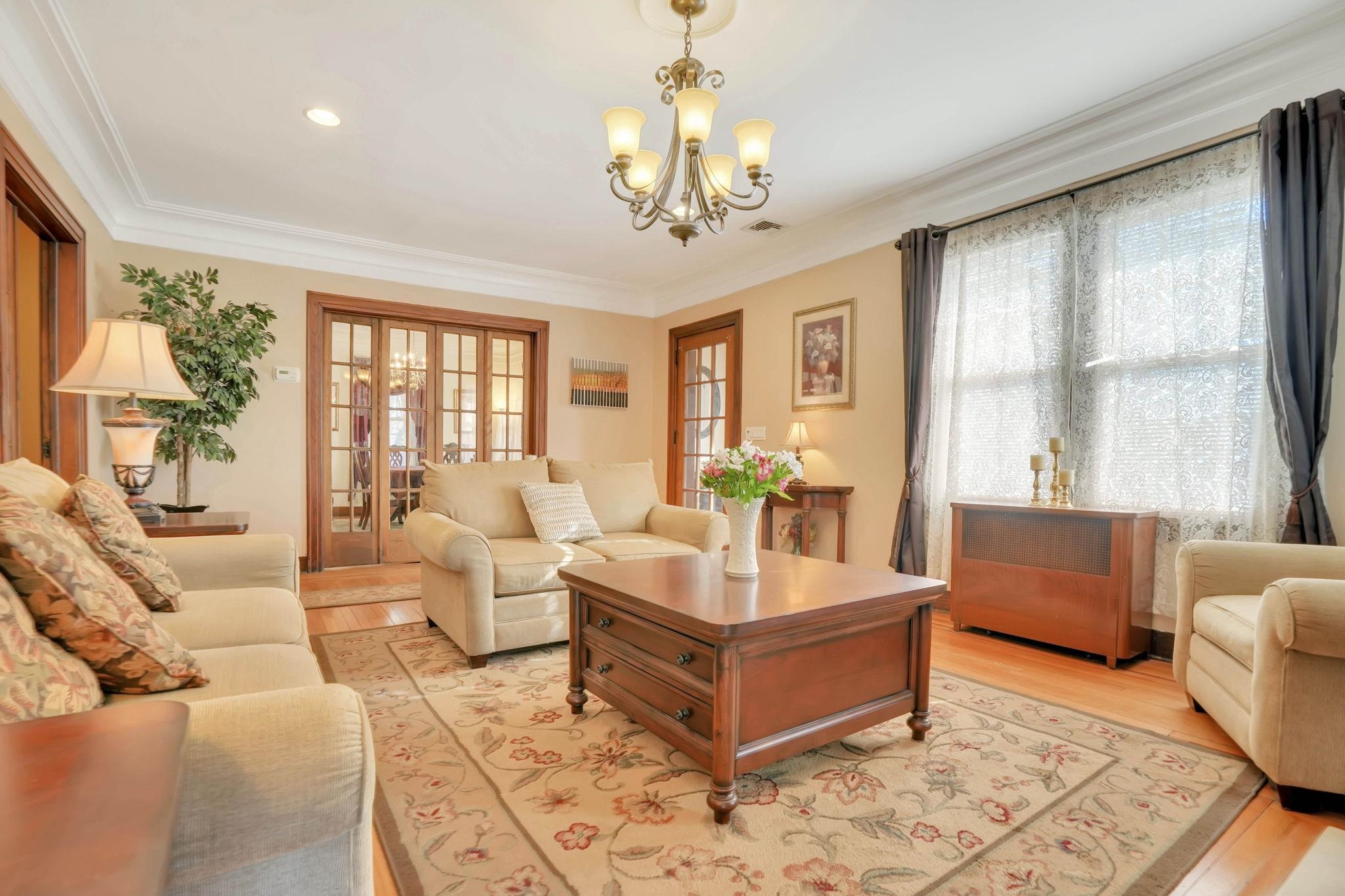 10 Lynn Court Rutherford, NJ 07070 - Photo 5 of 37 a living room with furniture a chandelier and a chandelier