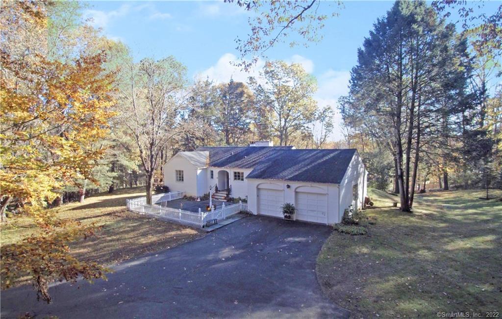 438 Branchville Road Ridgefield, CT 06877 - Photo 1 of 1 a view of a house with a yard