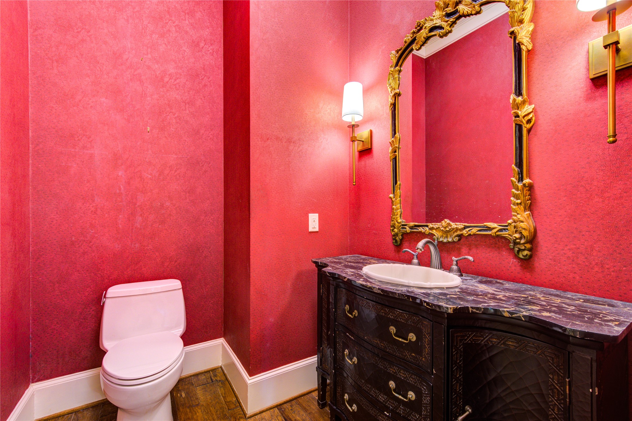 4615 Laurel Street Bellaire, TX 77401 - Photo 15 of 48 Formal powder bathroom has custom furniture with lavatory