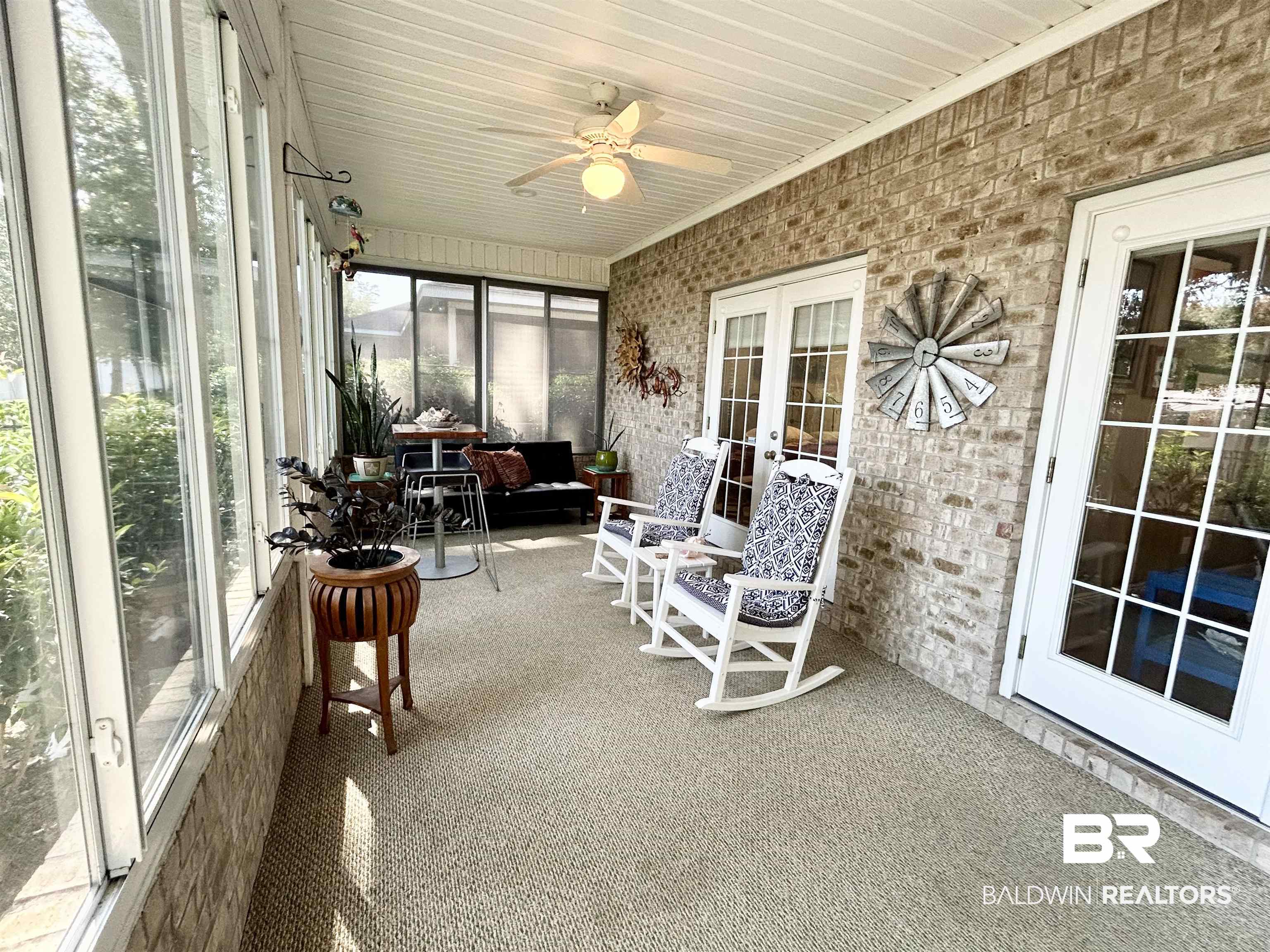 177 Mark Twain Loop Foley, AL 36535 - Photo 2 of 47 Wonderful Heated / Cooled Sunroom across the back of the home.