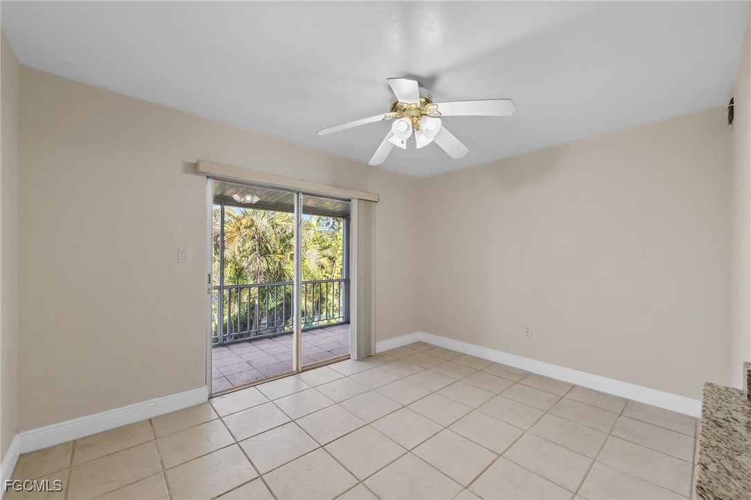2828 Jackson Street, Unit D8 Fort Myers, FL 33901 - Photo 14 of 37 a view of an empty room with a window