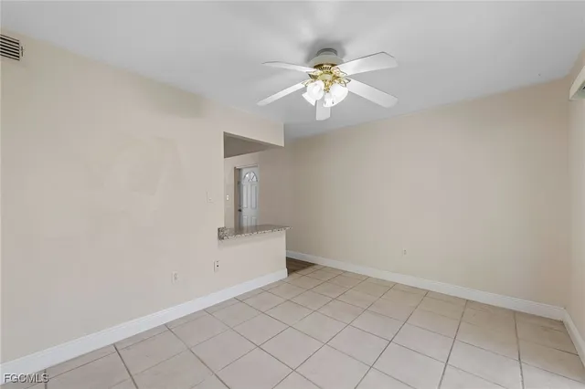 a view of an empty room with window