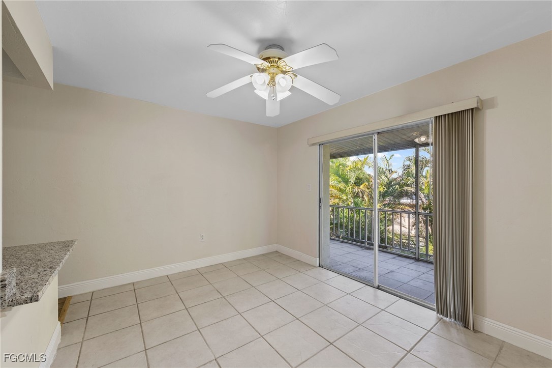 2828 Jackson Street, Unit D8 Fort Myers, FL 33901 - Photo 17 of 37 a view of an empty room with window