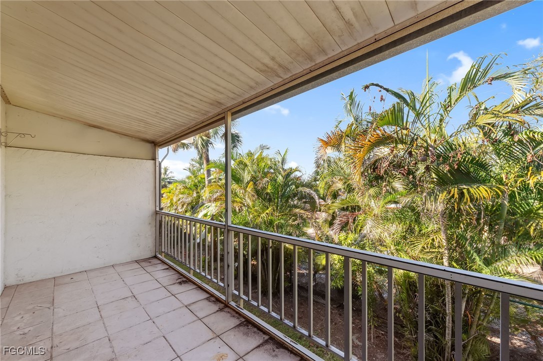 2828 Jackson Street, Unit D8 Fort Myers, FL 33901 - Photo 18 of 37 a view of balcony with wooden floor