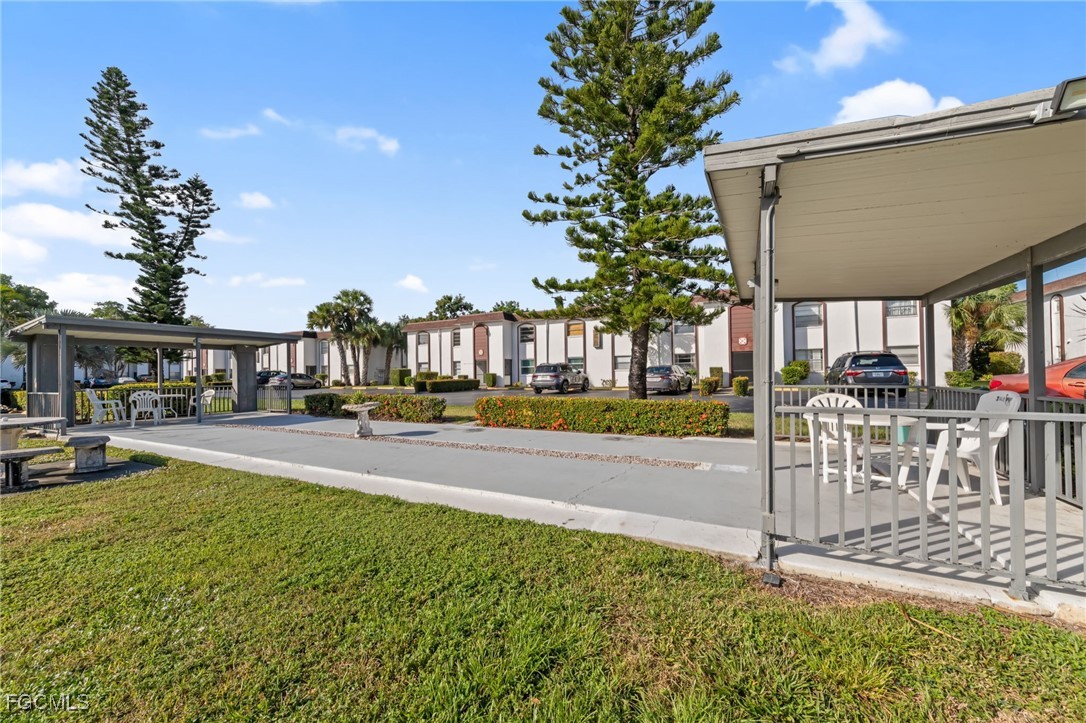 2828 Jackson Street, Unit D8 Fort Myers, FL 33901 - Photo 30 of 37 a view of outdoor space yard and patio