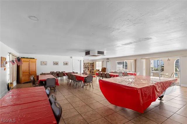 a work room with furniture and a window