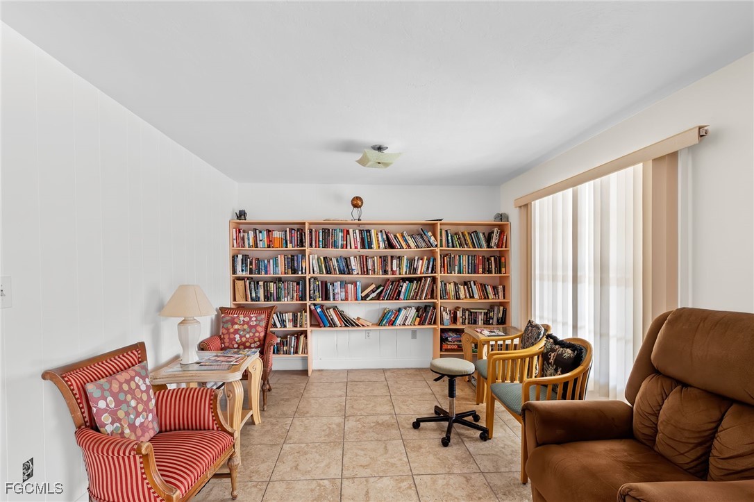 2828 Jackson Street, Unit D8 Fort Myers, FL 33901 - Photo 35 of 37 a work room with furniture and a window