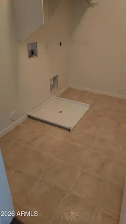 a bathroom with a toilet and a bathtub
