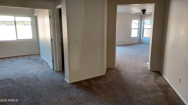 an empty room that has a window