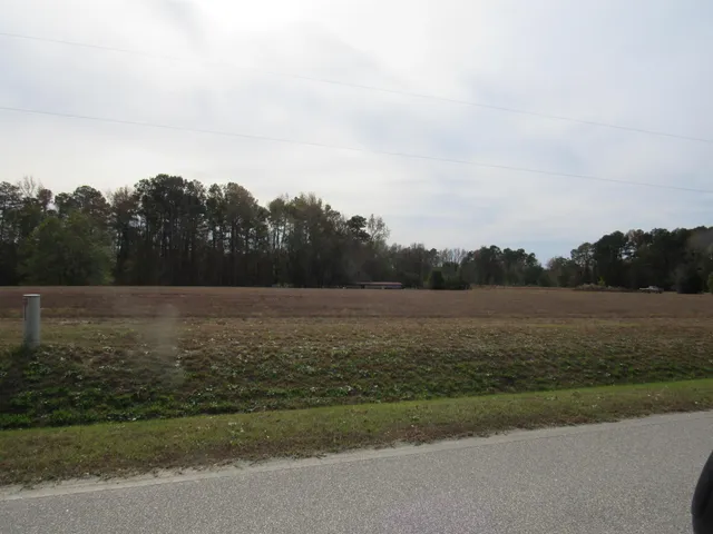a view of lake with green space