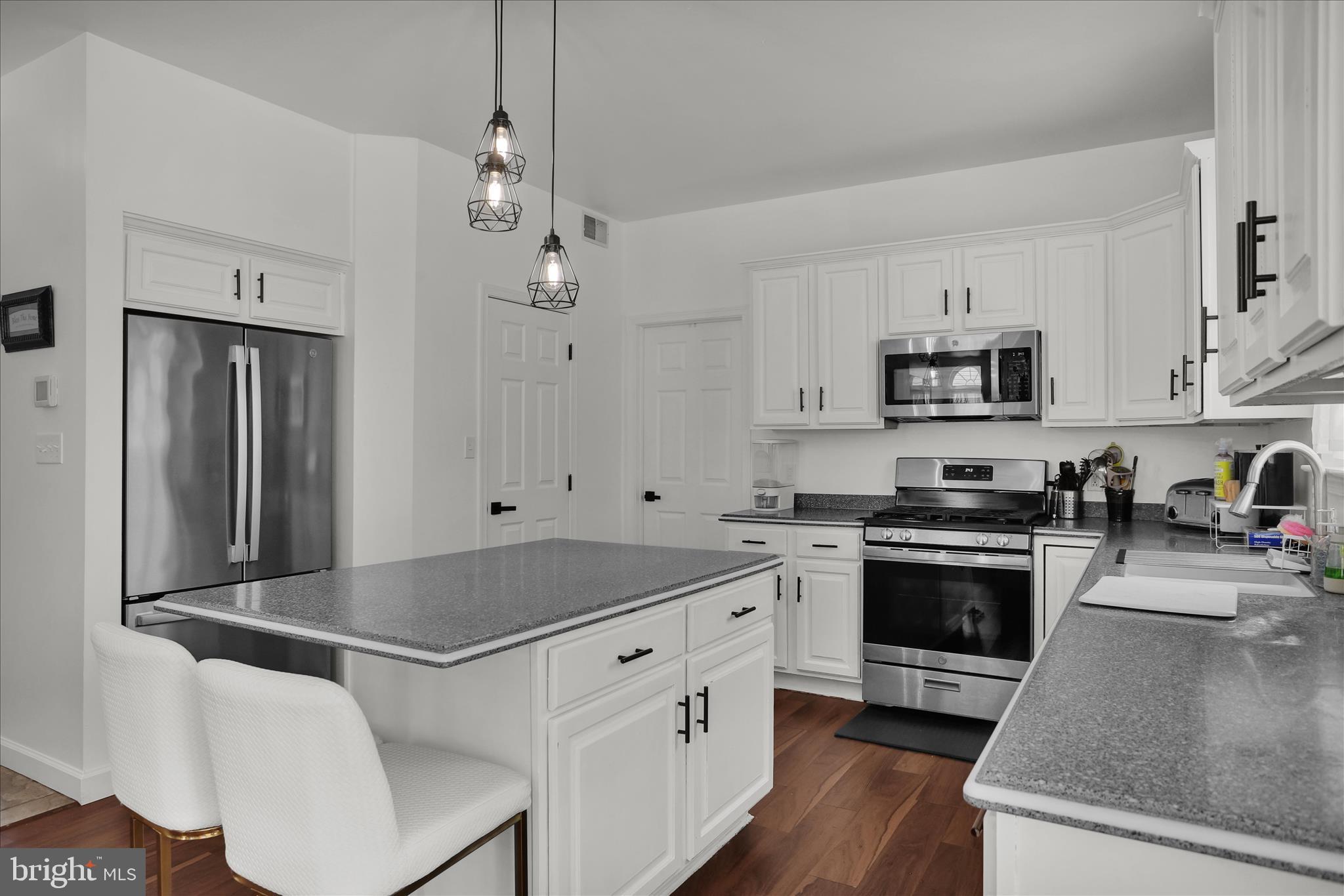36 Hayden Circle Reading, PA 19606 - Photo 11 of 41 a kitchen with stainless steel appliances granite countertop a sink stove and refrigerator