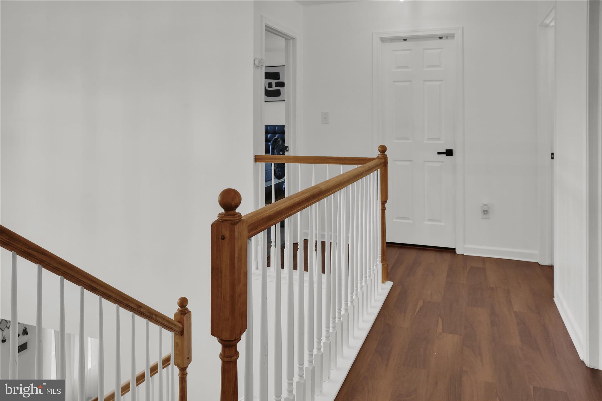 36 Hayden Circle Reading, PA 19606 - Photo 31 of 41 a view of staircase with wooden floor and white walls